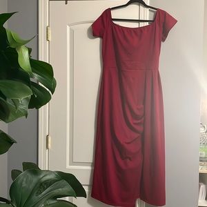 Red off the shoulder dress with side slit and drape